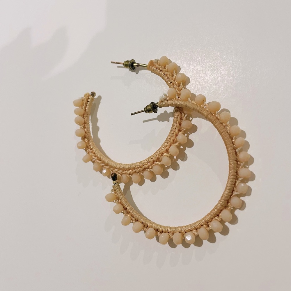 Peach colored hoops with rhinestones